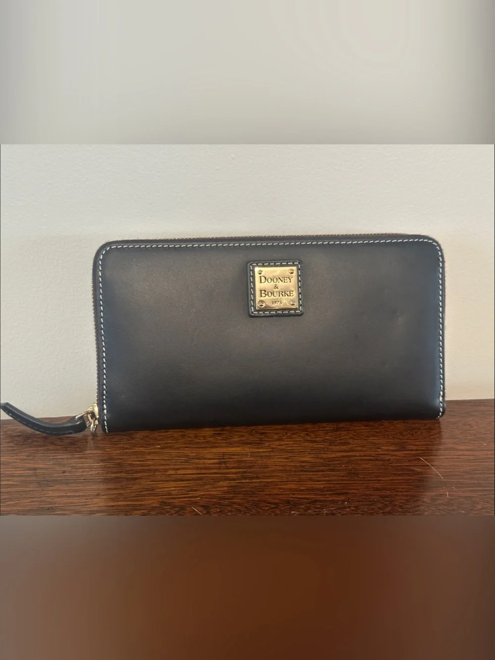 Dooney & Bourke Black Leather Zip-Around Wallet with Gold Logo